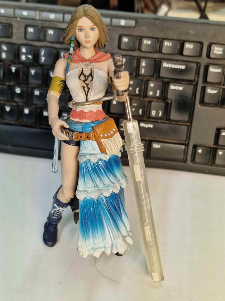 Figura: Yuna Rikku de Final Fantasy X-2. Figura articulada (LE FALTA UNA PISTOLA - ver foto)