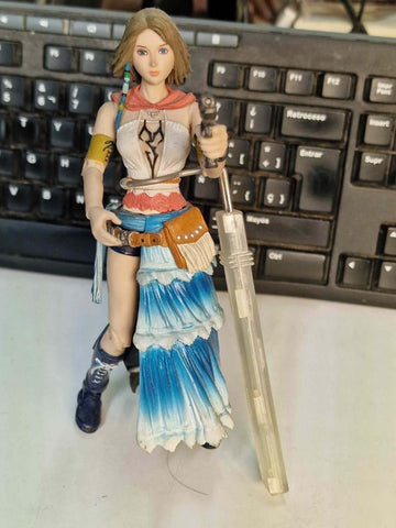 Figura: Yuna Rikku de Final Fantasy X-2. Figura articulada (LE FALTA UNA PISTOLA - ver foto)