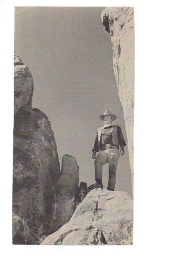 V48661: John Wayne vestido de vaquero