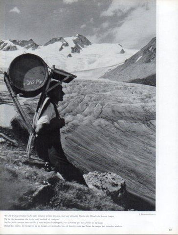 LAMINA V50147: Austria. Hombre llevando carga por un estrecho sendero