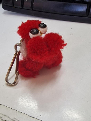Llavero: peluche con ojos saltones