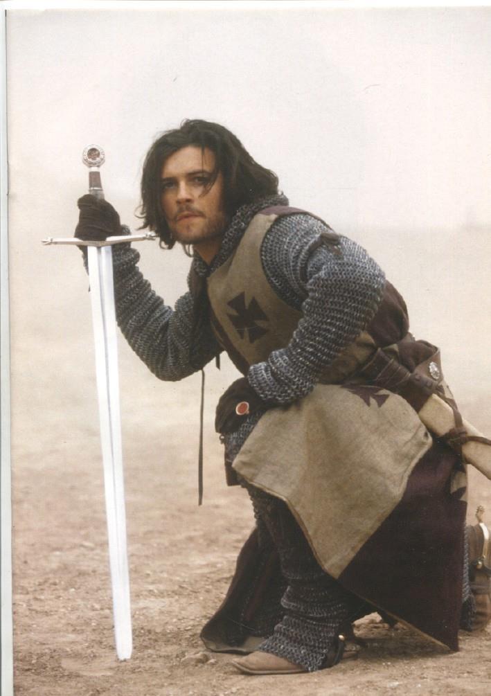 Foto artista: Nicolas Cage y Orlando Bloom