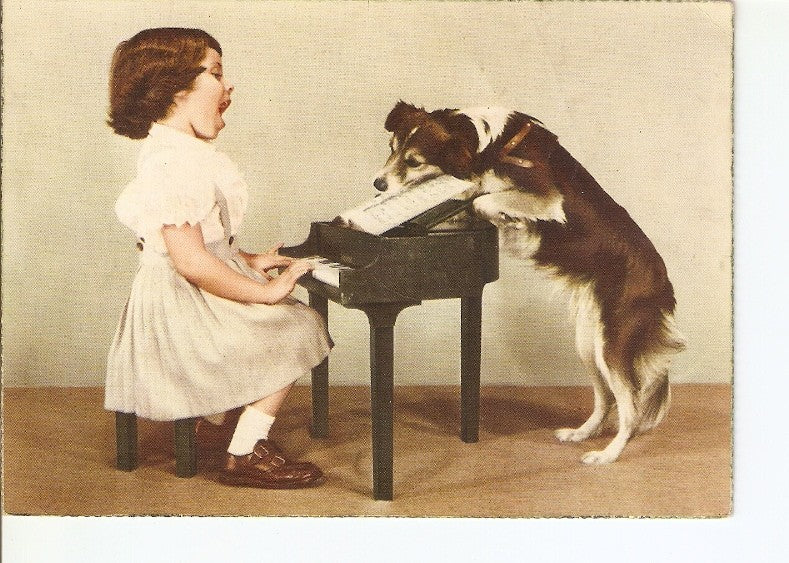 Postal 022294 : Niña tocando el piano y su perro