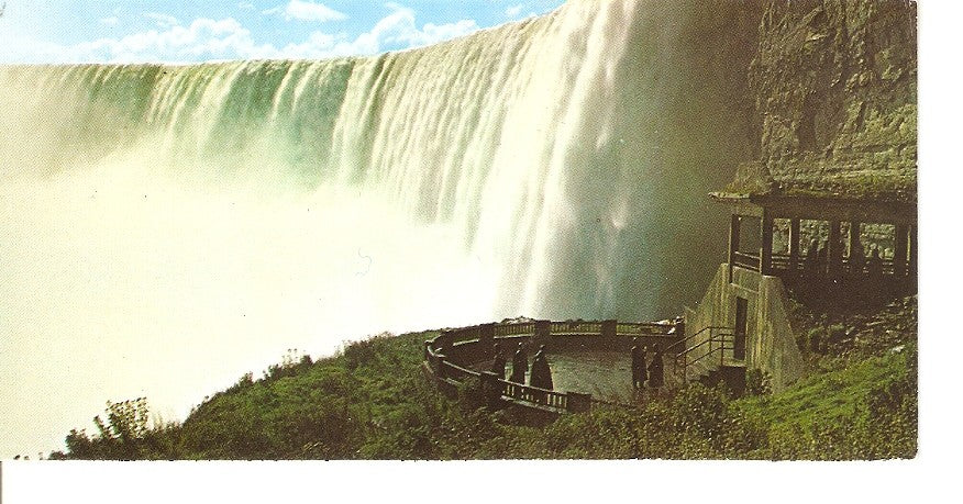 Postal 035711 : Observation Plaza. At the base of famed Table Rock House scenic view of the towering Canadian Horseshoe Falls. Niagara Falls Canada