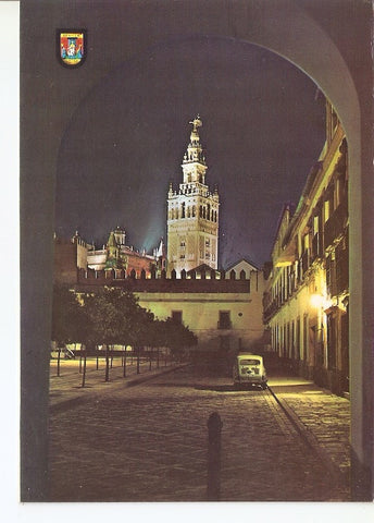 Postal 039715 : Sevilla. Patio de Baneras y Giralda iluminada