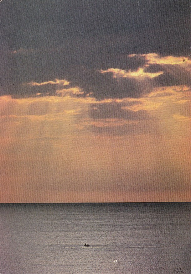 Postal 60477. Puesta de sol en el mar con barca en la lejania