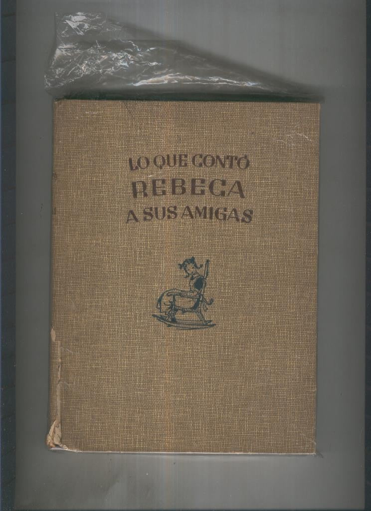 Lo que conto Rebeca a sus amigas (cubierta estropeada con rotos en la misma)