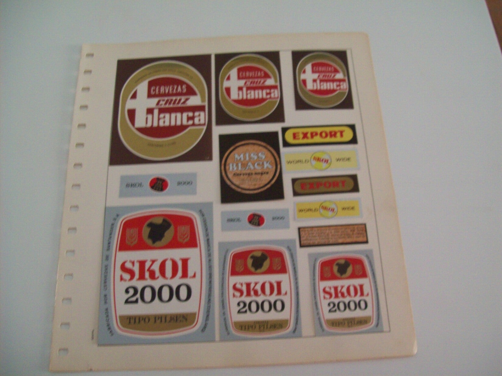 ETIQUETA LICOR 2309: Cerveza Cruz Blanca y Skol 2000