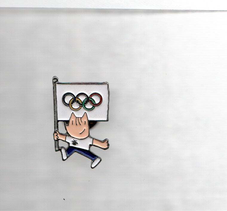 Pins: Cobi con la bandera olimpica