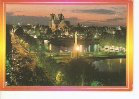 Postal 031499 : Paris la nuit. Vue generale sur lIle de la Cite. La cathedrale Notre-Dame