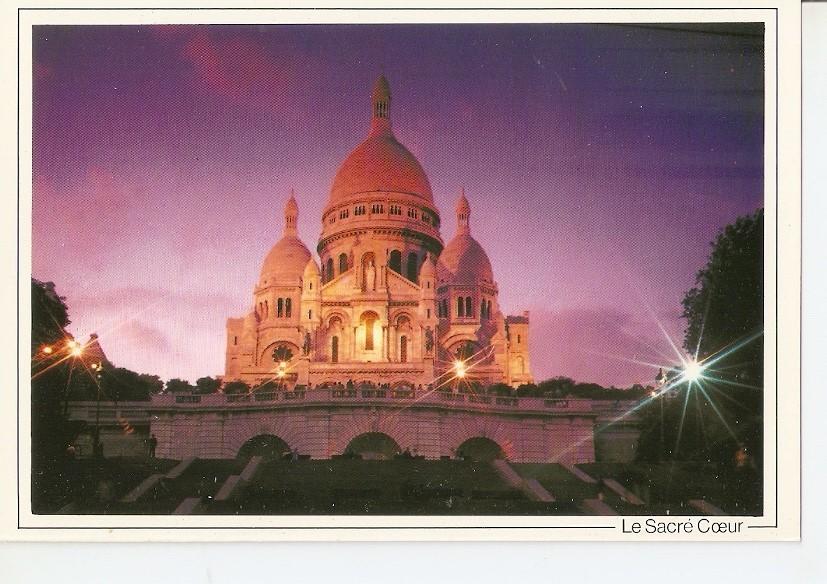 Postal 043018 : Paris au crepuscule. LArc de Triomphe au fond les Tours de la Defense et lArche de la Fraternite