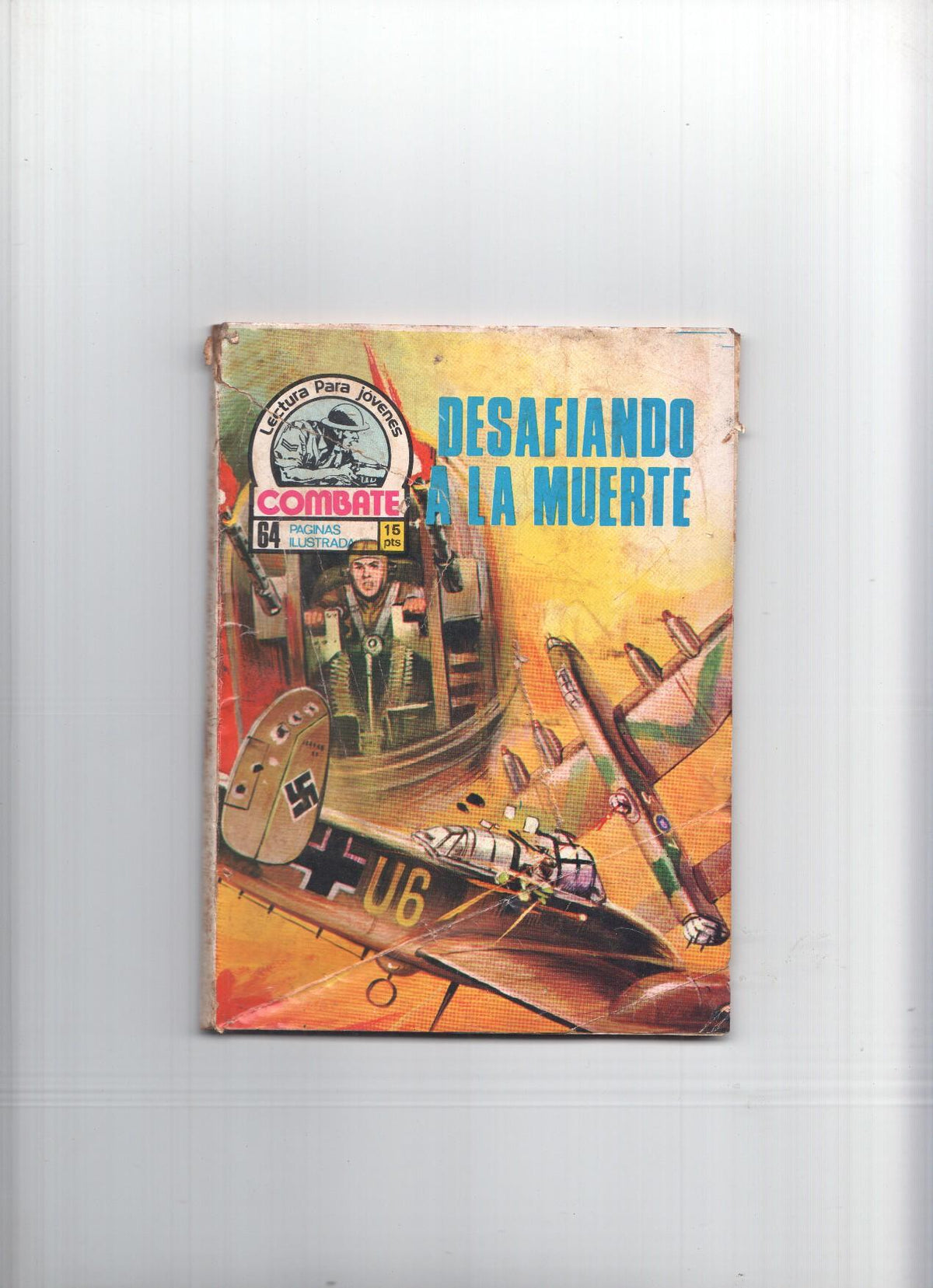 Combate numero : Desafiando a la muerte (cubierta rajada, roto primera pagina que afecta al dibujo)