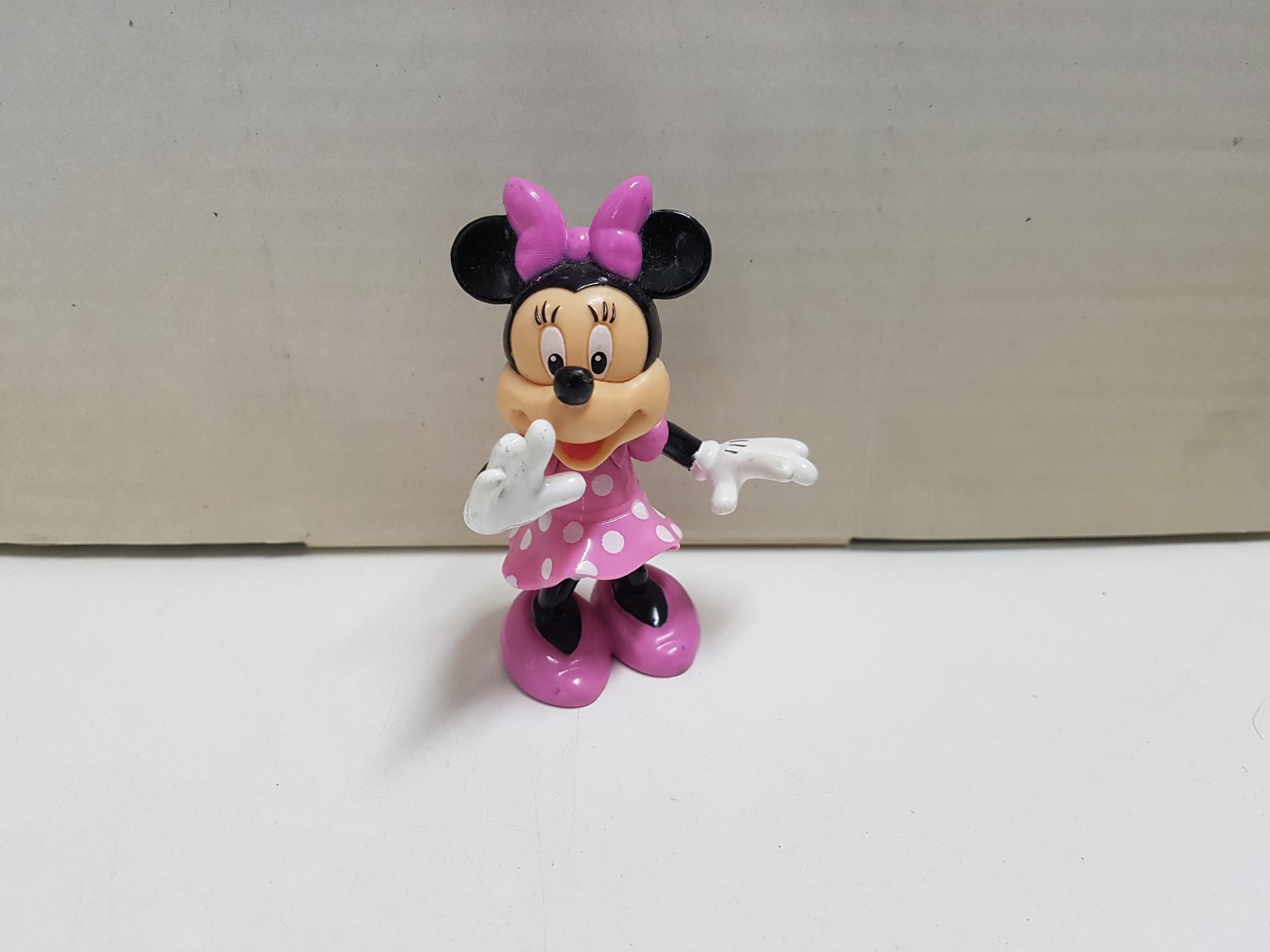 Figura: Minnie mouse mano levantada