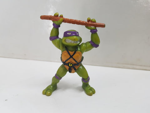 Figura serie Las Tortugas Ninja: Donatello, alzando su bo