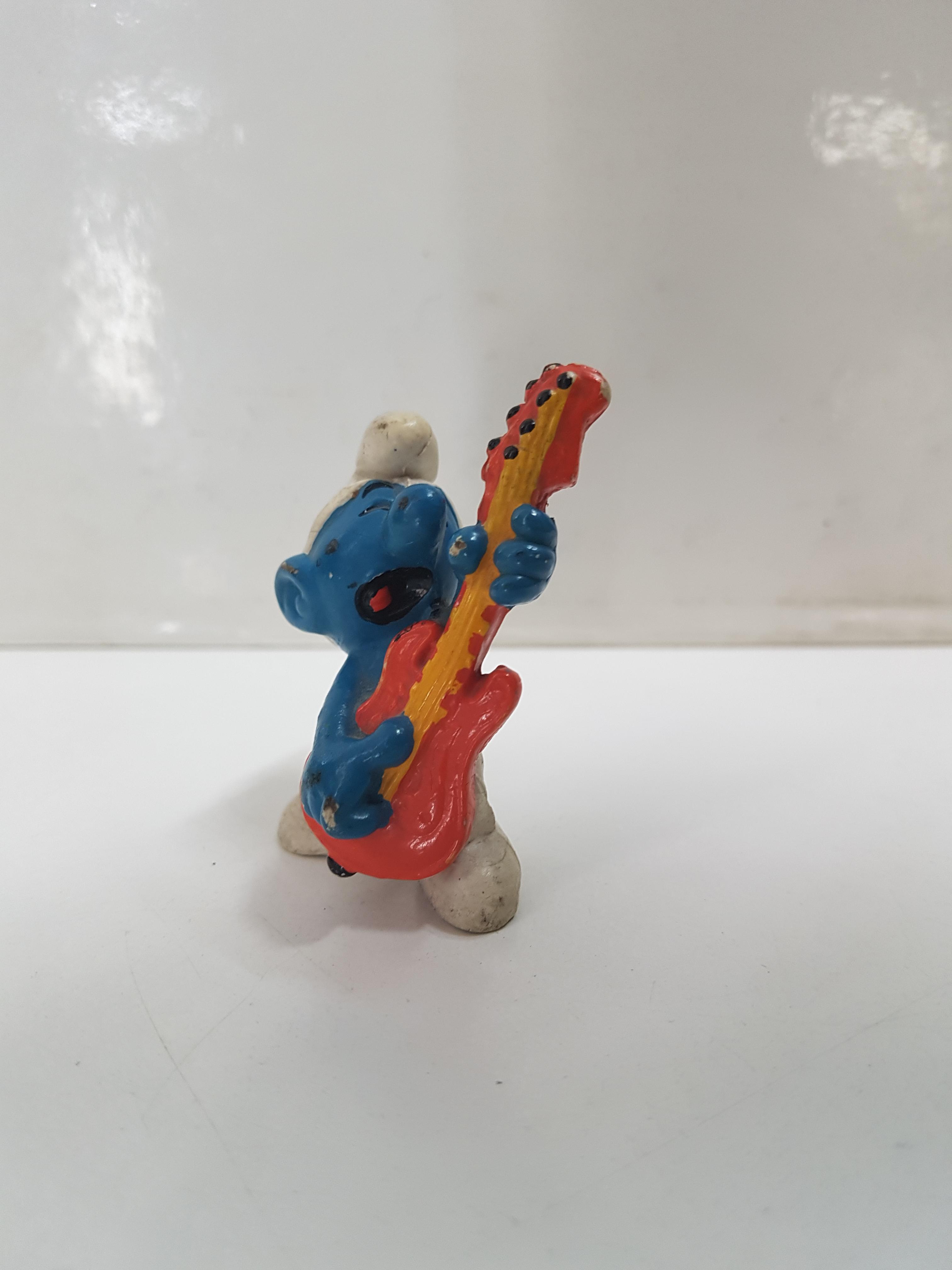 Figura serie Los Pitufos: Pitufo guitarra