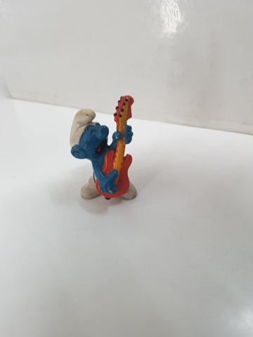 Figura serie Los Pitufos: Pitufo guitarra