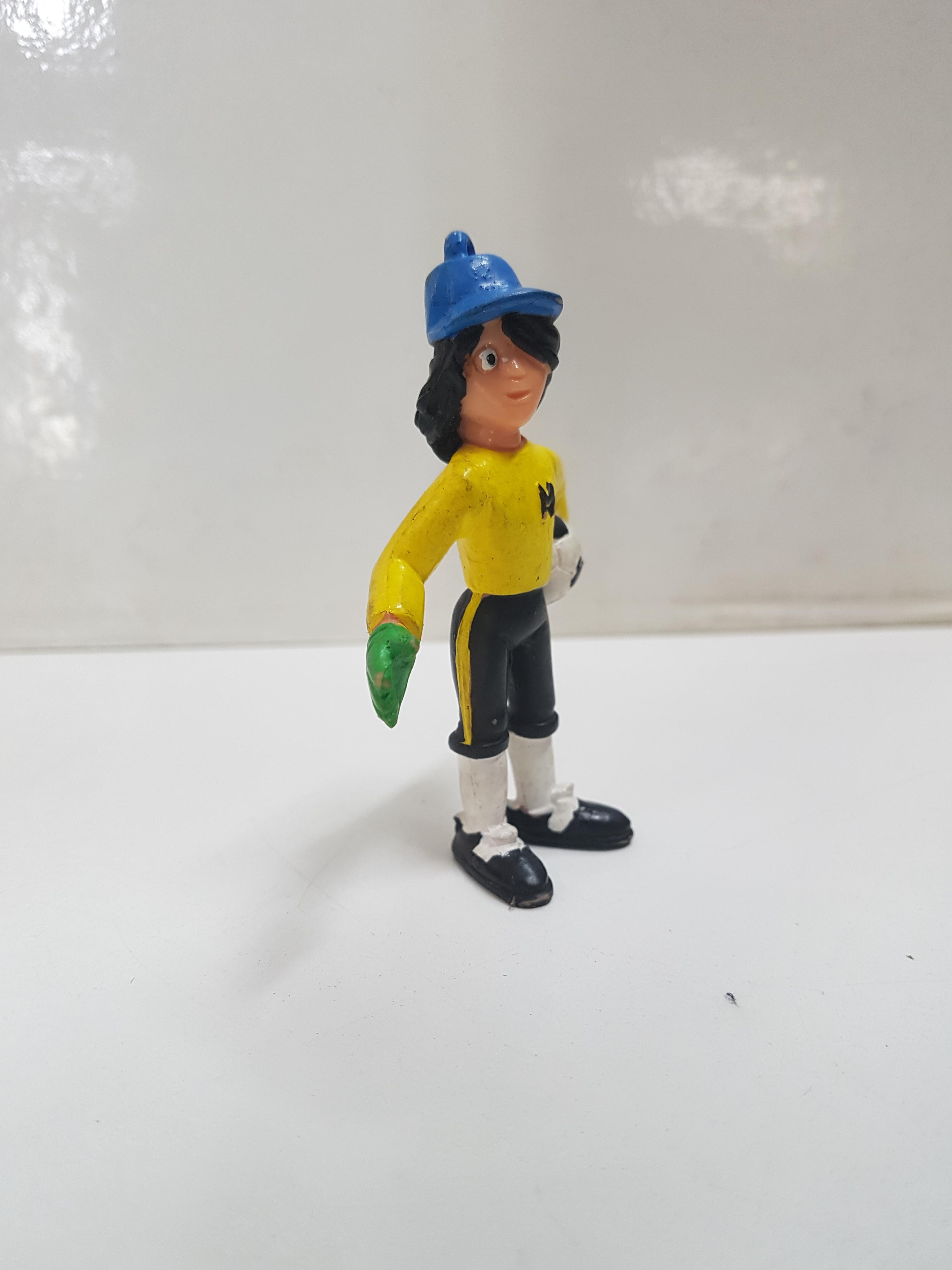 Figura serie Campeones: Ed Warner