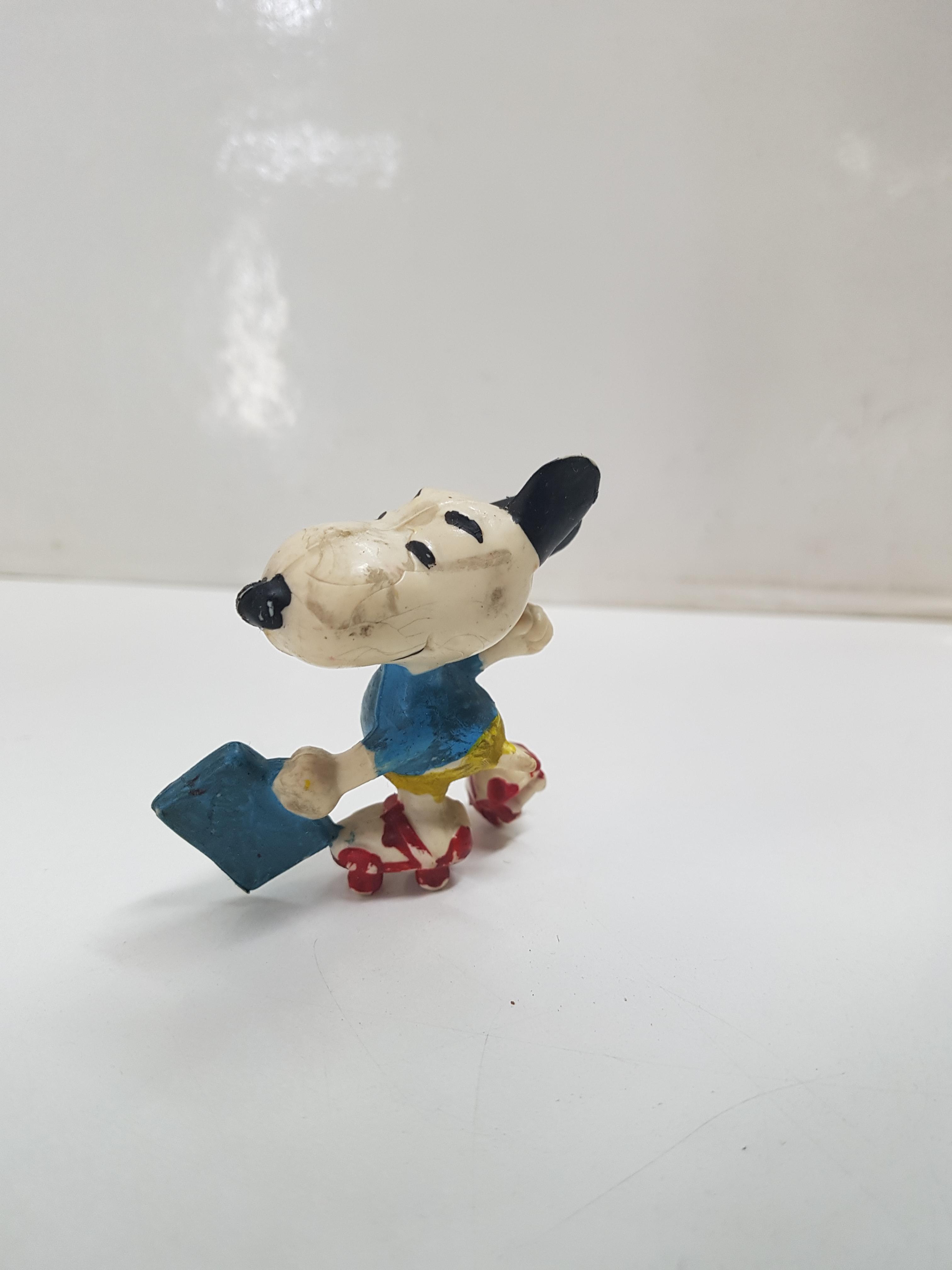 Figura comic Peanuts: Snoopy en patines