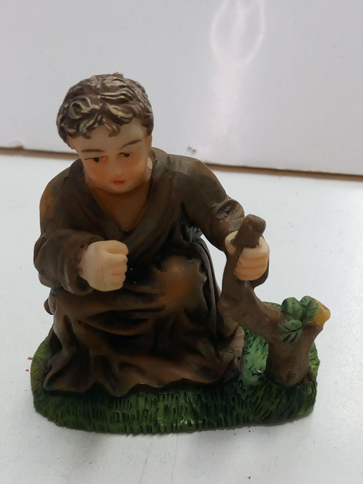 Figura decorativa de niño Caganet