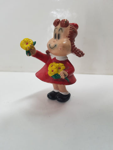 Figura serie La Pequeña Lulu: Lulu con flores 