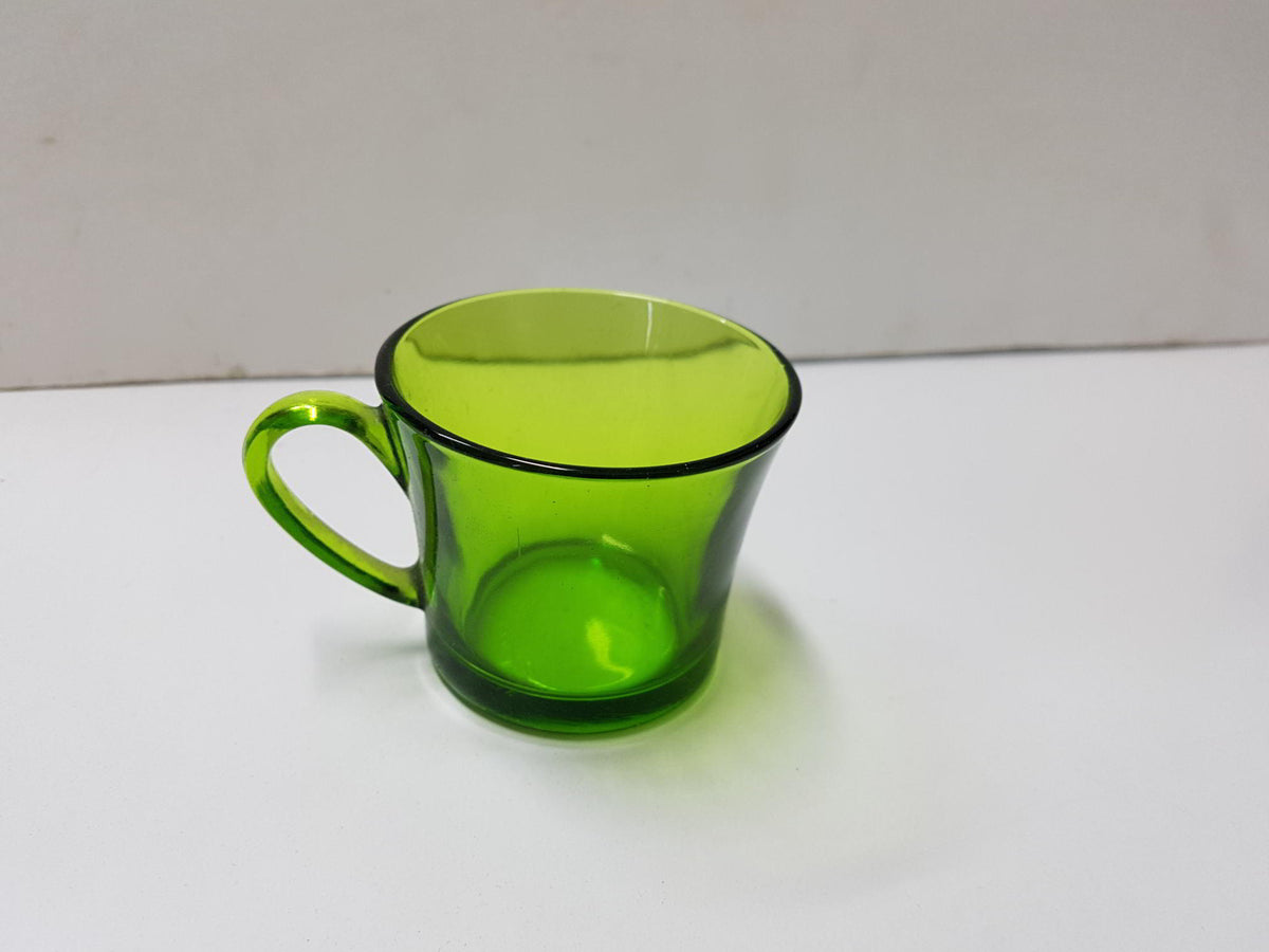 Vaso o taza de cristal color naranja con asa