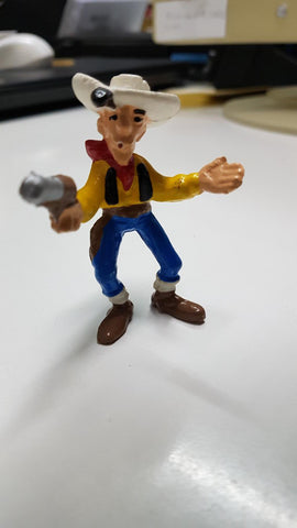 Figura PVC: Lucky Luke brazos abiertos y pistola en mano