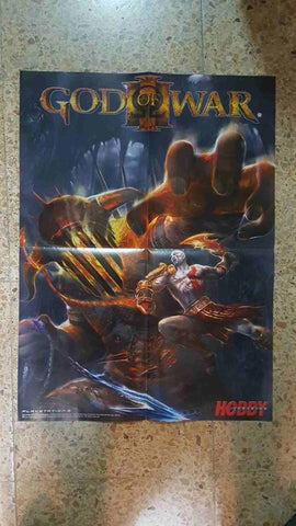 Poster desplegable doble: Metal Gear Solid Rising y God of War III. Proviene de la revista Hobby Consolas