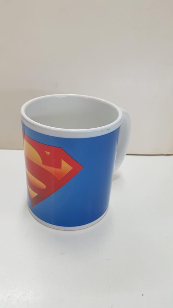 Taza con asa de cerámica: Logotipo de Superman con fondo azul