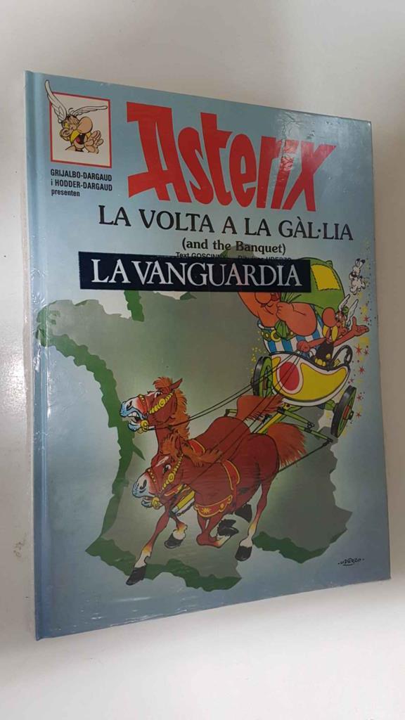 Coleccion Asterix num 06: Asterix la volta a la Gal.lia (and the Banquet). Bilingue con textos en catalan e ingles. La Vanguardia