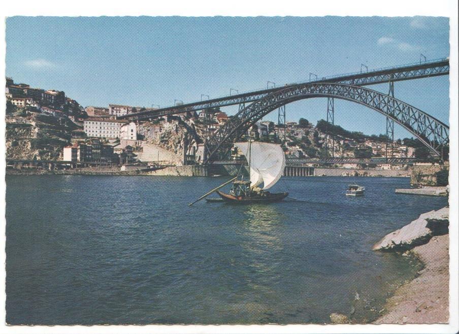 Postal JC029: Porto (Portugal). Barco Rebelo e Ponte de D. Luiz I