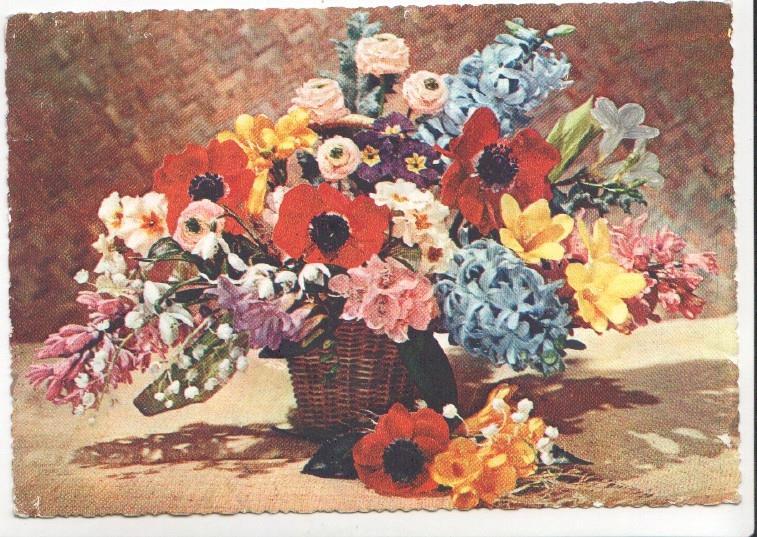 Postal JC0838: Cesto de mimbre lleno de flores varias. Postal dentada