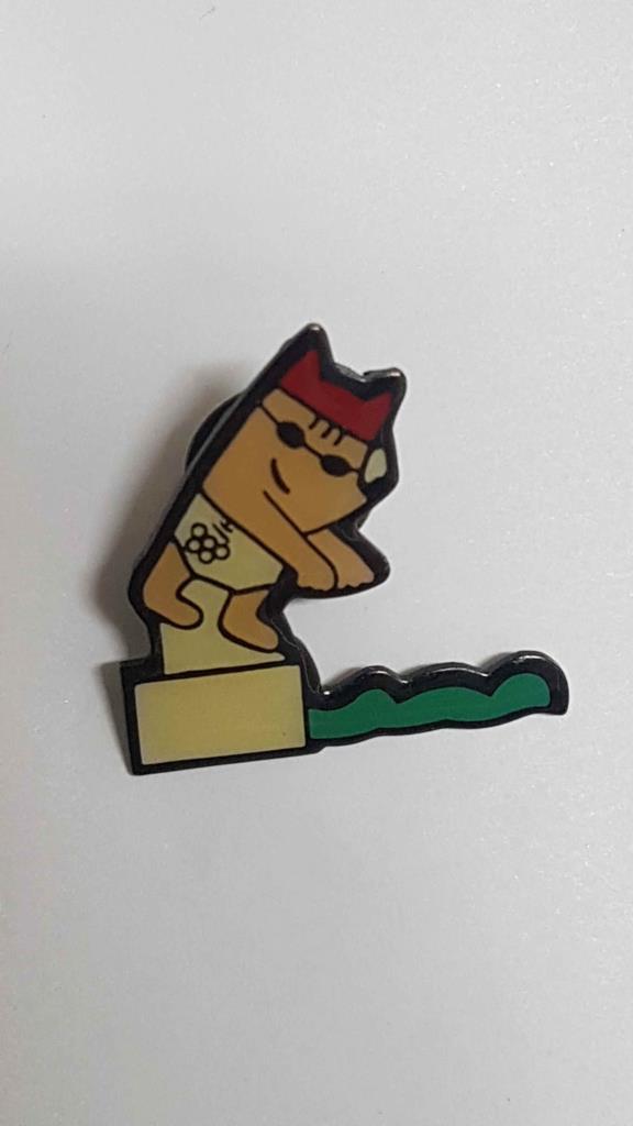 Pins: Cobi a punto de lanzarse a la piscina, Mascota de las Olimpiadas de Barcelona 1992