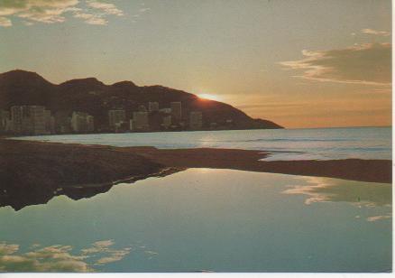 Postal E04412: Amanecer Playa de Levante.Benidorm, Alicante
