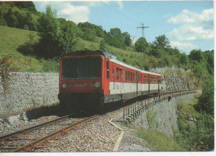 Postal E02870: L'autorail x 2734. Dôle- St-Claude, longe la vallée de la Biene peu après Tancua
