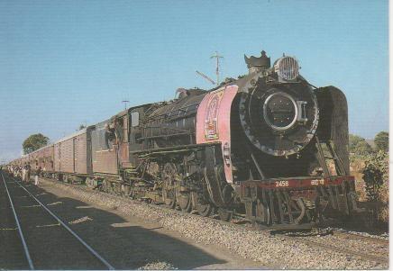 Postal E03026: Ferrocarriles de la India IR YP 2458 con un tren de pasjeros entre ajmer y Ratloam