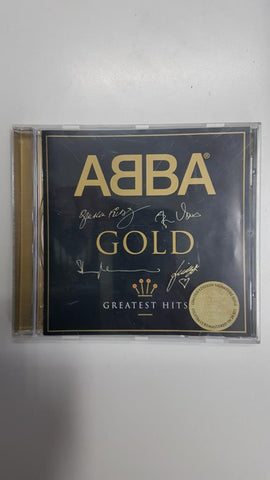 CD musica: Abba Goold. Greatest hits. Dancing Queen, Mamma Mia, Super Trouper entre otros. Limited edition signature